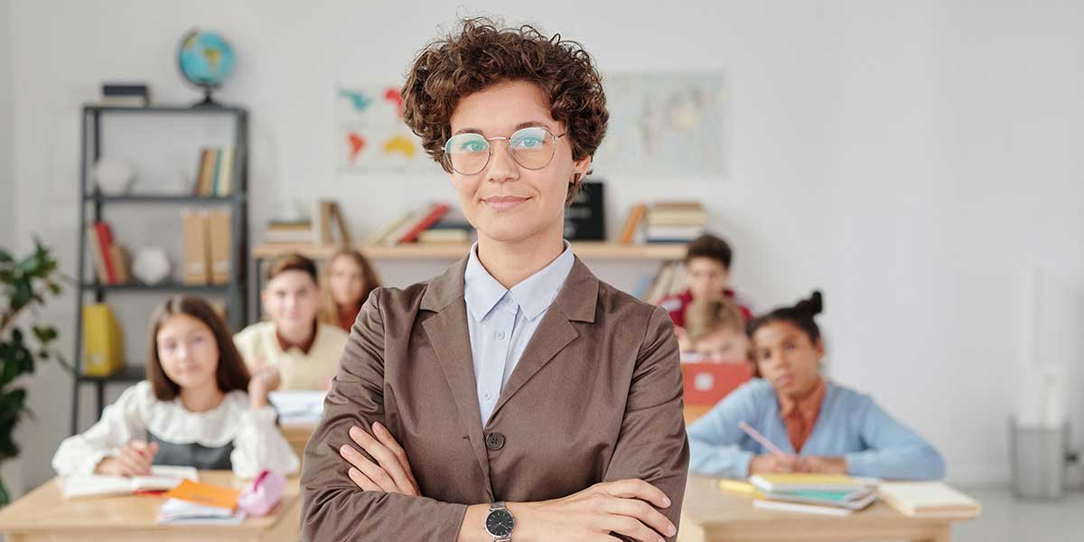 teacher standing in front of students