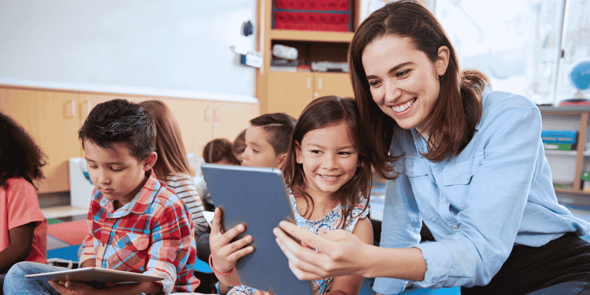 teacher and student using ipad